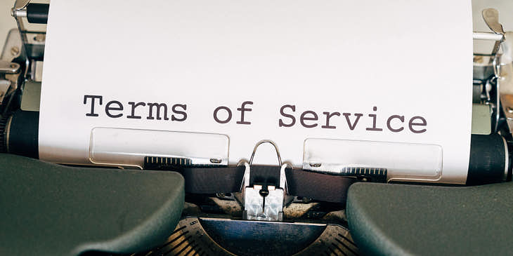 Typewriter with "Terms of Service" typed out