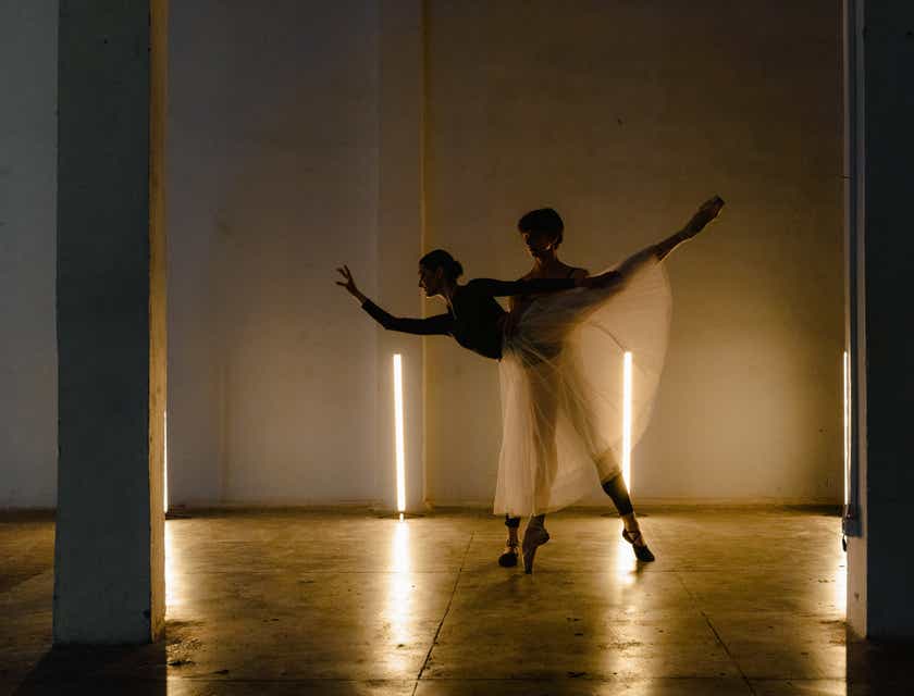 Two ballet dancers dancing together.