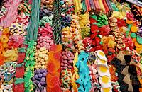 A variety of candies laid out in a candy store.