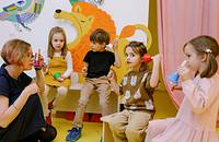 A group of children playing at a daycare center.