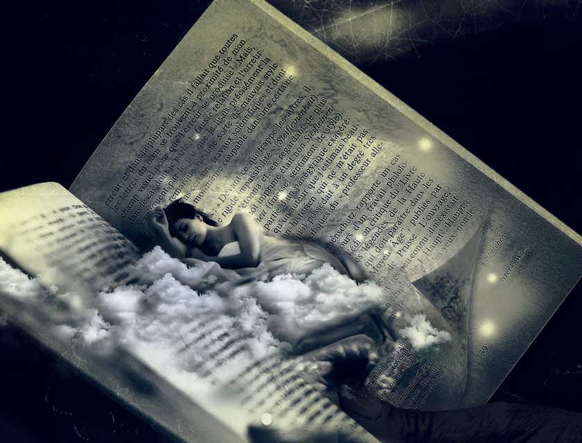 A fanciful image of a woman sleeping on the open pages of a book.