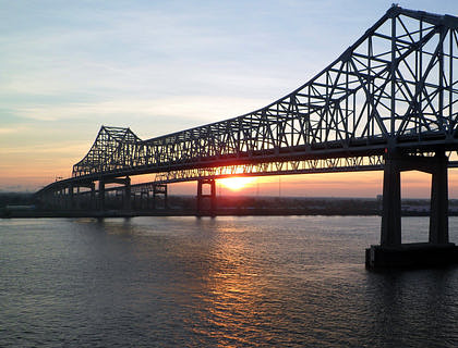 Old Vicksburg Bridge (also known as the "Mississippi River Bridge") at sunrise.