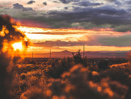 A sunset view over a desert landscape.