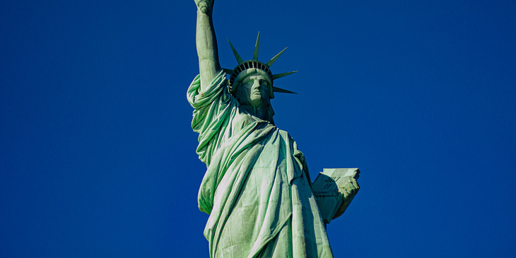 Statue of Liberty against a blue sky