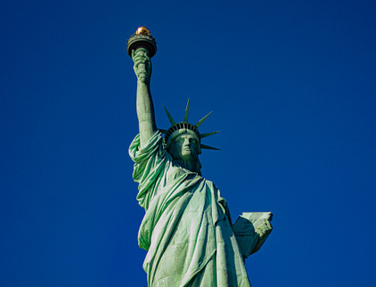 Statue of Liberty against a blue sky