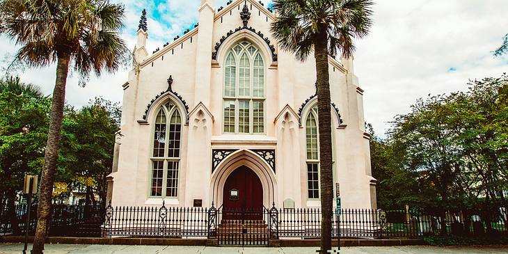 The historical French Protestant Church with two palm trees in Charleston, South Carolina