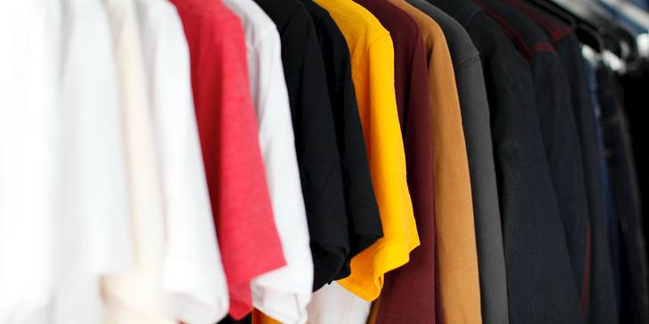 T-shirts hanging on a rack.