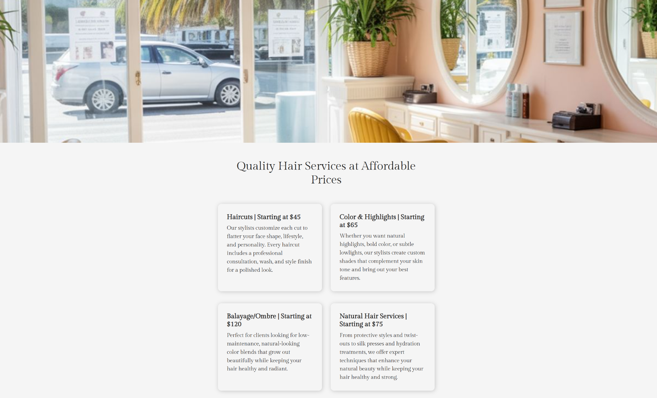 Pricing section from Love Locks Studio displaying four white service boxes for “Haircuts,” “Color & Highlights,” “Balayage/Ombre,” and “Natural Hair Services,” set against a soft, peach-toned salon interior with mirrors and greenery