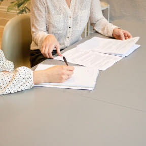 Review candidates' resumes.