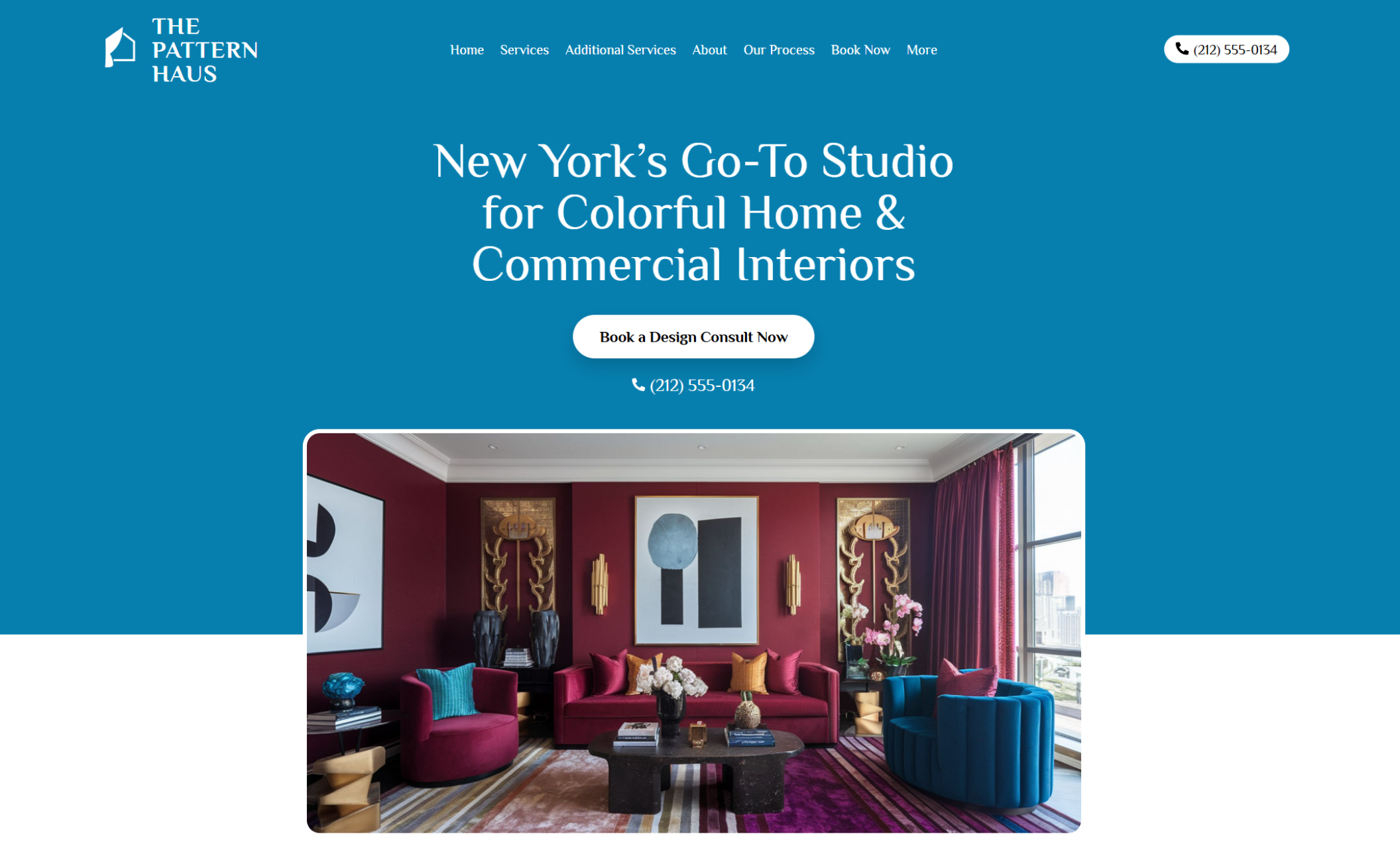 Vibrant living room with deep red walls, jewel-toned furniture, and bold striped rugs highlighting The Pattern Haus’s maximalist style and colorful design identity