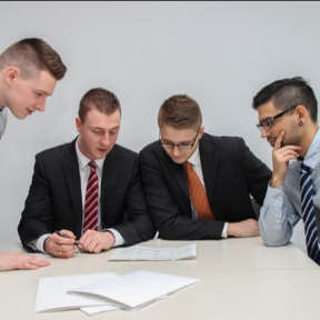 Decide whether to use a registered agent service.